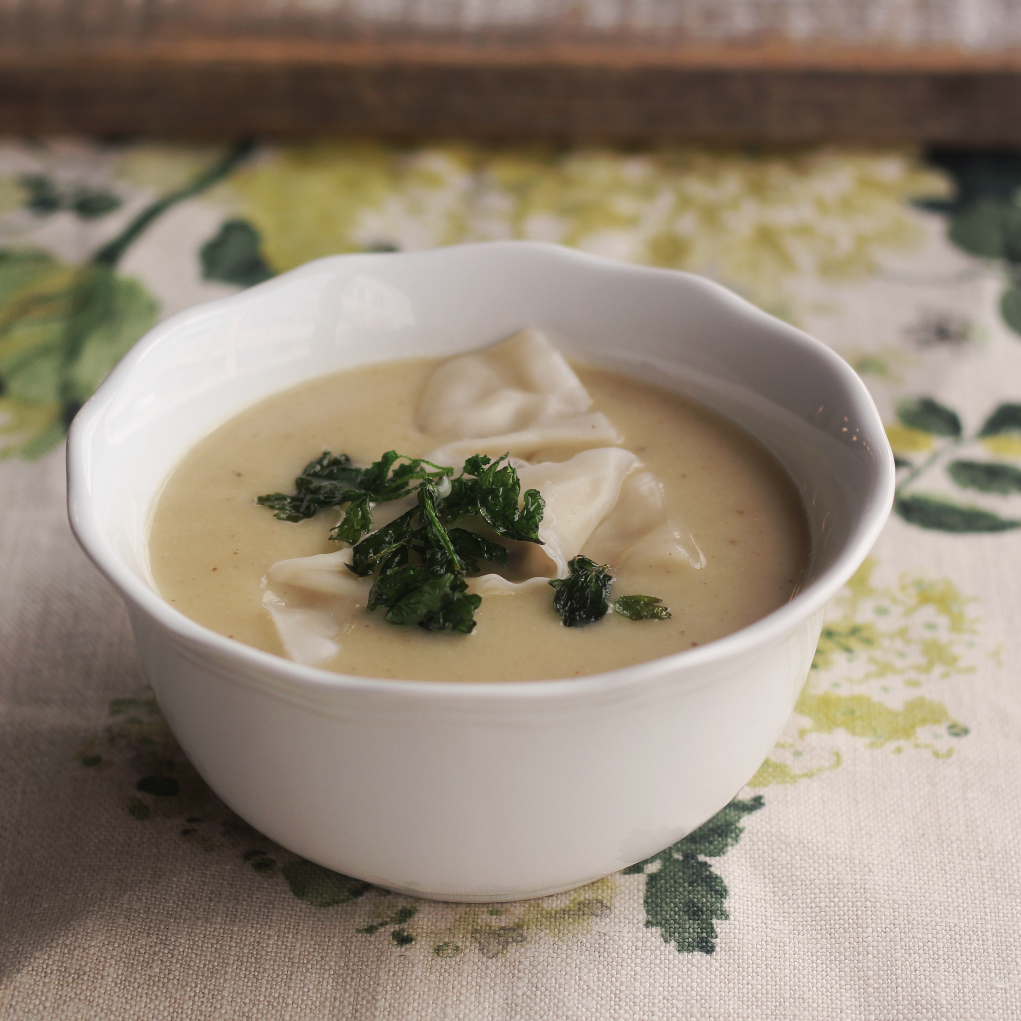 Truffle Potato Soup With Truffle Mushroom Dumplings And Fried Parsley
